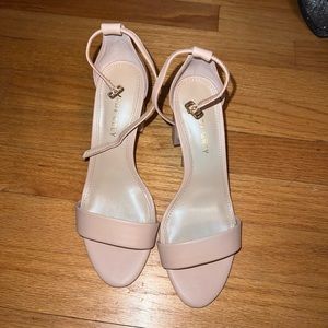 Nude heels, worn one time. Size 7 fits like a 6.5